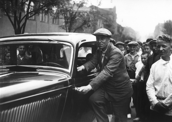 Eugeny Khaldei. Alexey Stakhanov with the car presented to him by Stalin. Moscow. 1936. Digital imprint. Collection of MAMM