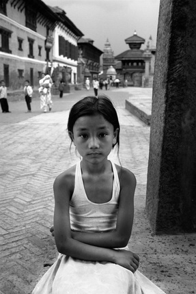 Yuri Rost.
Small girl in the square at Bhaktapur. Nepal